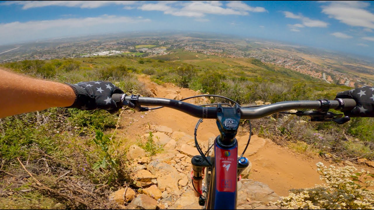 Riders climbing a ridgeline